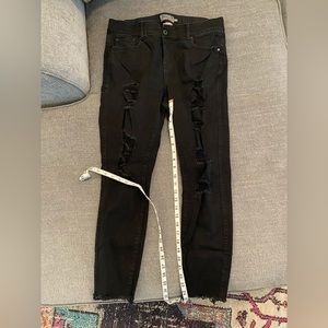 Black distressed Bombshell skinny jeans